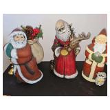 Ceramic Santas. 9-11-in tall.