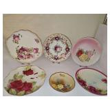 Six porcelain plates with roses. Diameter 6-10.5 in