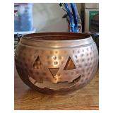 Cooper look tin jack-o-lantern bucket.12.5 in diameter X 8 in tall not including handle.
