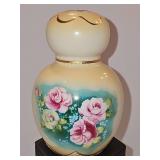Hand painted Shaker or hat pin holder. Delicate pink and yellow roses against a cream and aqua background with gold trim. 5.25 in tall.
