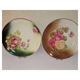 Two platter size plates with roses. 12.25 in and 13.25 in.