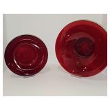 Two ruby red bowls. 8.5 in diameter and 11.25 in (with starburst) diameter.