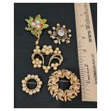 Pearl look brooches. Bottom right is Avon, bottom left is Monet.