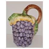 Grape cluster design pouring pitcher. 10 in tall including handle