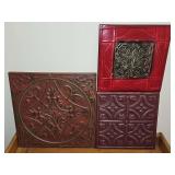 Three embossed tin panels. 16x16, 12x12, and 12x12.