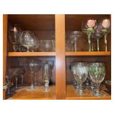 Contents of kitchen cabinet - brandy glasses, wine glasses, Christmas design stemware, margarita & martini glasses