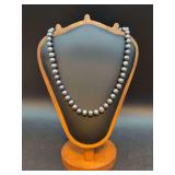 Research indicates this to be Cultured Freshwater Peacock Pearl Necklace with 14K white gold clasp - 16”