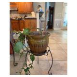 Round wrought iron plant stand and ceramic planter with live plant - 12”D x 23-1/2” tall to top of planter