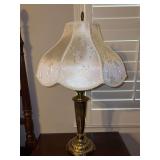 vintage brass table lamp with a fluted column base and a scalloped, floral-patterned fabric bell lampshade - 27-1/4” tall