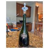 Segura Viudas Reserva Heredad Cava green glass bottle featuring a distinctive pewter base and crest - 15-1/2” tall
