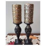 Pair of heavy resin ornate gold wash candlesticks with gold pillar candles featuring a Fleur de Lis design - total height is 15”