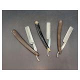 Grouping of (3) black handled straight razors - left is by GENCO, center is by Antoni Tadross (2835) and right is J.R. Torrey