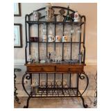 Well built wrought iron and wood bakers rack/bar rack with (2) glass shelves, glassware rack, faux slate top and bottom display/wine bottle rack area (wine bottle rack is removable)