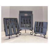 Grouping of (3) boxes of serving utensils - perfect for those upcoming holiday parties - box on right has 1 missing spreader
