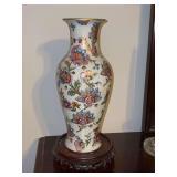 Vintage hand-painted floral porcelain vase, styled in traditional Asian decorative motifs with gold trim accents, resting on wood base - 13-1/2 tall w/base