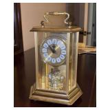 Battery powered gold-tone Anniversary Clock - needs batteries & back will not stay closed when moved