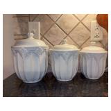 Set of  (3) Williams-Sonoma Grande Cuisine ceramic canisters with rubber seals - 7”, 6-1/4” and 5-3/4” tall