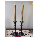Pair of metal bronze color candlesticks with gold ribbed candles - candlesticks stand 8-1/2” tall