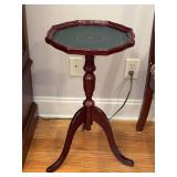 Very nice mahogany pie crust top table with green top and gold-color design - 14”D x 25-1/2 tall