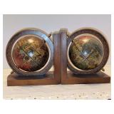 Pair of wooden spinning globe bookends - 6”w x 6-1/4” tall - one has an arched top