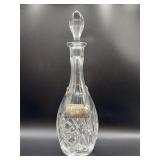 Vintage crystal decanter with a matching faceted stopper and Williamsburg sterling “Sherry” bottle tag