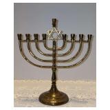 Vintage brass Hanukkah menorah (chanukiah) featuring a Star of David emblem - does have candle wax residue on base - 8-1/2 x 9-3/4