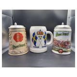 Grouping of (1) tankard and (2) Pilsner Urquell steins