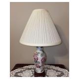 Vintage Chinoiserie-style porcelain ginger jar table lamp decorated with pink and green peony florals with a carved wood base - 21-1/2” tall