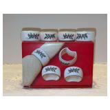 Set of (4) Christmastime NIKKO porcelain napkin rings in original box