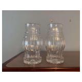 Two 9 1/4 inch Crystal candle holders. There is one chigger on base of one