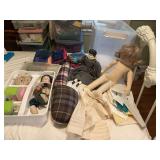 Vintage porcelain doll in good shape, various doll items and doll patterns and material swatches and rulers￼
