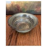 Handmade pottery bowl in green and browns 6” x 2 3/4”. K—BVP on bottom