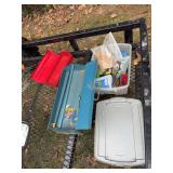 Two metal toolboxes and tote of miscellaneous lawn items