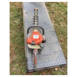 Husqvarna gas powered hedge trimmer. No fuel to test but pulls freely.