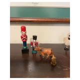 Vintage cow made in Japan, brown and black miniature, toy soldier, Nutcracker, and a plastic dog