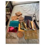 Assortment of miscellaneous items; plate racks, ribbon, material swatches, and cedar blocks