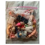 Large bag of vintage miniature dolls