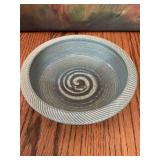 Swirl bottom pottery bowl with a lip. 6 1/2” x 1 3/4”