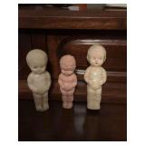 Vintage tiny HP baby doll frozen Charlotte-penny doll 3 1/4 inch, 3 1/4 inch celluloid plastic baby doll 3 1/4 inch, and a 3 inch pink hard plastic doll holding tummy