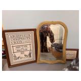 13 1/2 x 20“ antique beveled mirror with two crossed stitching pieces