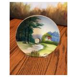Vintage hand-painted 5 1/4 inch porcelain scene of cottage in woods. Japan.