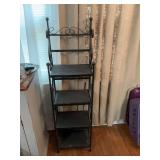￼ Vintage black metal shelf 14“ x 10“ x 52“. The glass shelves have been replaced with black paper board.