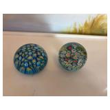 2 Marano, Italy-Millefiori paperweights with blue and aqua base with floral millefiori canes.  2 1/2 and 2 inch.