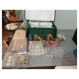 Avon bag full of jewelry making supplies and beads with containers