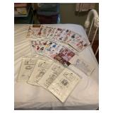 Assortment of 15 doll patterns.
