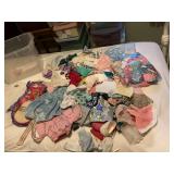 Assortment of various doll clothes, and accessories