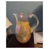 Signed 9 1/2 inch hand blown iridescent pitcher