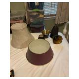 Assortment of lampshades,; three cloth black and gold, two metal black and gold, a tan 14 x 10“ and a purple metal 12 1/2 x 5 1/2“