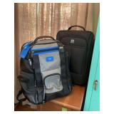 18 1/2 inch black suitcase, and a nice Tumi blue and black backpack