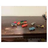Assortment of miniature cars and train.
